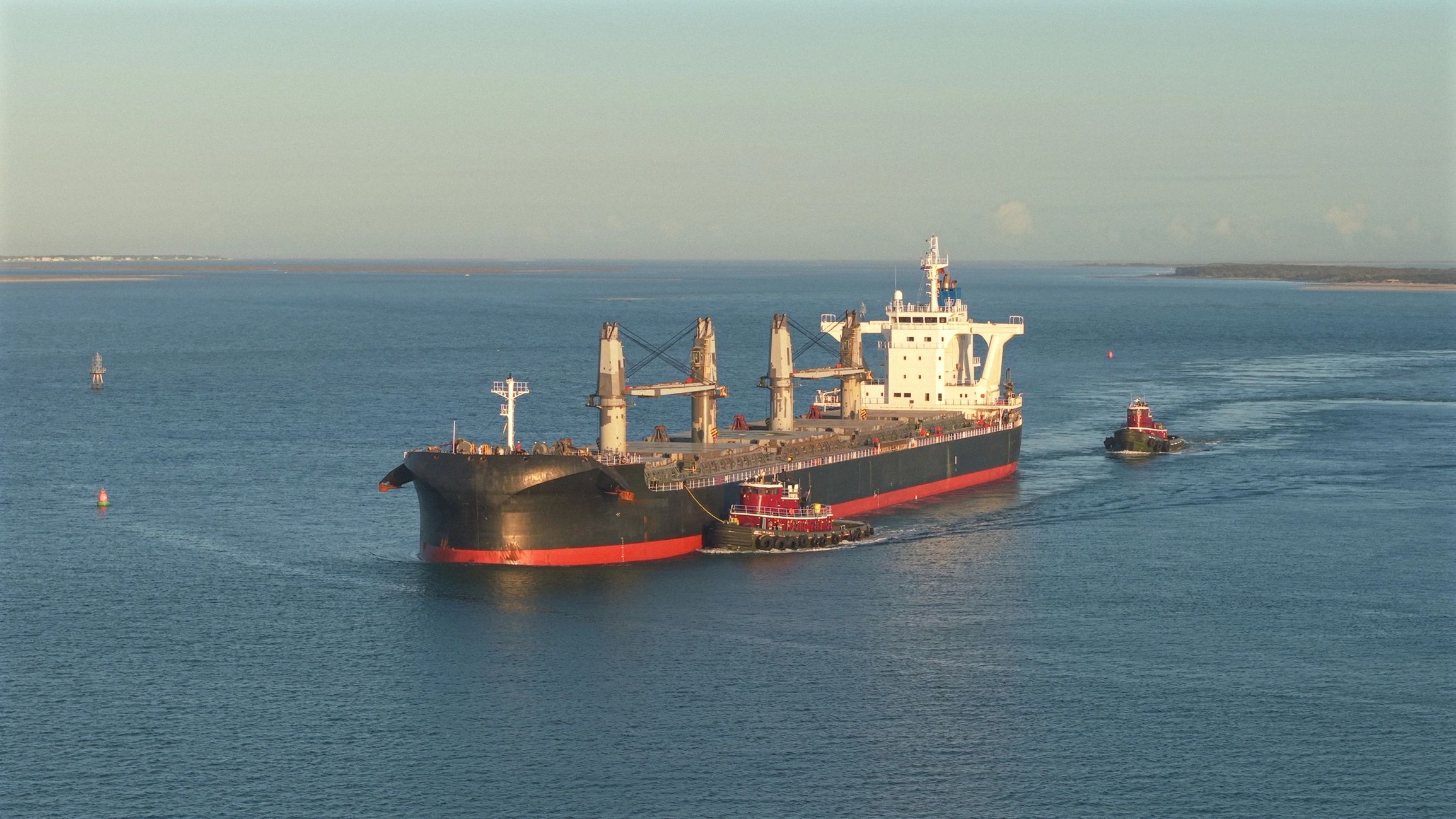 Bulk carrier ship representing destination market delivery